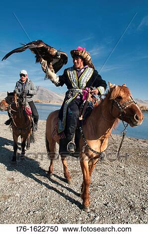 Kazakh eagle hunters and their golden eagles in the Altai Region of Bayan-? lgii in Western Mongolia View Large Photo Image Stock Image - Kazakh eagle hunters and their golden eagles in the Altai Region of Bayan-? lgii in Western Mongolia. Fotosearch