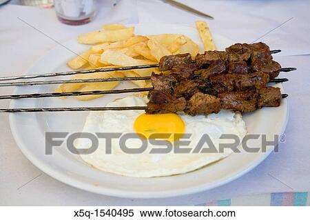 Kebab with egg and potatos, Morocco View Large Photo Image Stock Photography - Kebab with egg and potatos, Morocco. Fotosearch