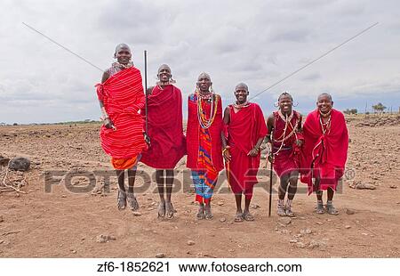 Kenya Africa Amboseli Masai men in red costume dress and beads in Amboseli National Park safari 1 View Large Photo Image Stock Image - Kenya Africa Amboseli Masai men in red costume dress and beads in Amboseli National Park safari 1. Fotosearch