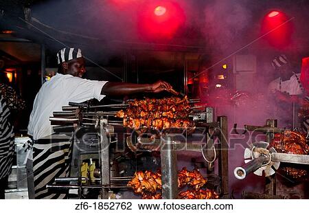 Kenya Nairobi Africa the famous grill at the Carnivore restaurant called Beast with a Feast with game meat cooking 11 View Large Photo Image Stock Image - Kenya Nairobi Africa the famous grill at the Carnivore restaurant called Beast with a Feast with game meat cooking 11. Fotosearch