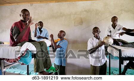 Stock Photo - KENYA Pwani Secondary School for the Deaf in Kalifi The students are talking in sign language photo by Sean Sprague. Fotosearch