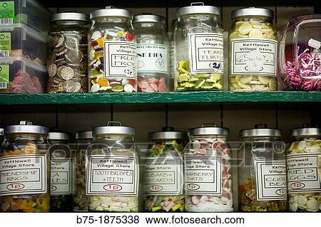 Kettlewell Village Store, UK, North Yorkshire, The Dales, Shelves with jars of traditional sweets View Large Photo Image Stock Photo - Kettlewell Village Store, UK, North Yorkshire, The Dales, Shelves with jars of traditional sweets. Fotosearch
