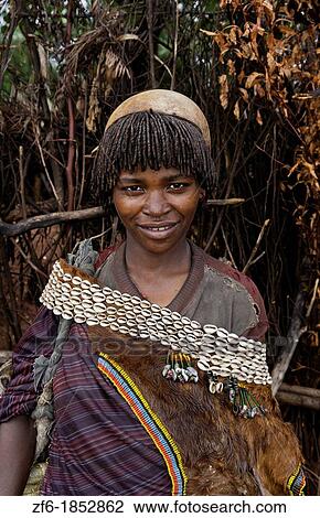 Key Afer Ethiopia Africa village Lower Omo Valley closeup of a Hamar or Hammer woman traditional outfits and red hair portrait 14 View Large Photo Image Stock Image - Key Afer Ethiopia Africa village Lower Omo Valley closeup of a Hamar or Hammer woman traditional outfits and red hair portrait 14. Fotosearch