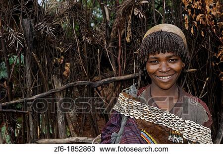 Key Afer Ethiopia Africa village Lower Omo Valley closeup of a Hamar or Hammer woman traditional outfits and red hair portrait 14 View Large Photo Image Stock Image - Key Afer Ethiopia Africa village Lower Omo Valley closeup of a Hamar or Hammer woman traditional outfits and red hair portrait 14. Fotosearch