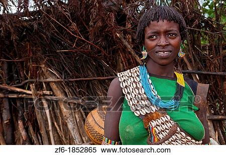 Key Afer Ethiopia Africa village Lower Omo Valley closeup of a Hamar or Hammer woman traditional outfits and red hair portrait 14 View Large Photo Image Stock Photography - Key Afer Ethiopia Africa village Lower Omo Valley closeup of a Hamar or Hammer woman traditional outfits and red hair portrait 14. Fotosearch