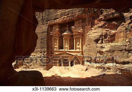 Khasneh, the Treasury temple, from the Siq canyon Petra Jordan Nabatean art View Large Photo Image Stock Image - Khasneh, the Treasury temple, from the Siq canyon Petra Jordan Nabatean art. Fotosearch