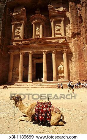 Khasneh, the Treasury temple, from the Siq canyon Petra Jordan Nabatean art View Large Photo Image Stock Photo - Khasneh, the Treasury temple, from the Siq canyon Petra Jordan Nabatean art. Fotosearch