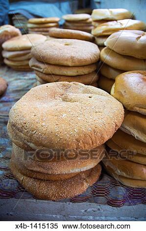 Khobz the Moroccan bread inside covered markets outside Medina old town Tangier Morocco northern Africa View Large Photo Image Stock Photography - Khobz the Moroccan bread inside covered markets outside Medina old town Tangier Morocco northern Africa. Fotosearch