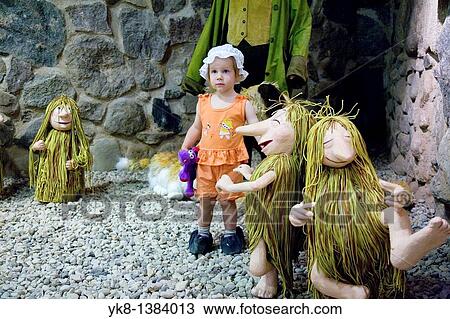 Kid Girl in Fairy-Tale House at Pokumaa, V? ru County, Estonia View Large Photo Image Stock Image - Kid Girl in Fairy-Tale House at Pokumaa, V? ru County, Estonia. Fotosearch