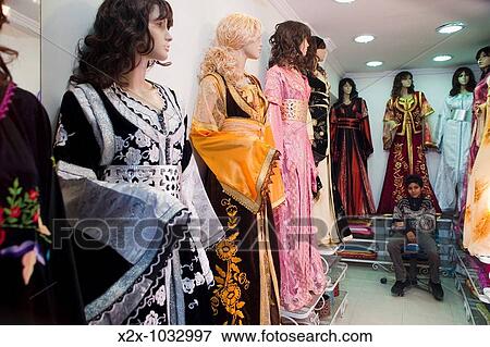 Kid in a formal dress shop, Oujda, Oriental region, Morocco View Large Photo Image Stock Photo - Kid in a formal dress shop, Oujda, Oriental region, Morocco. Fotosearch