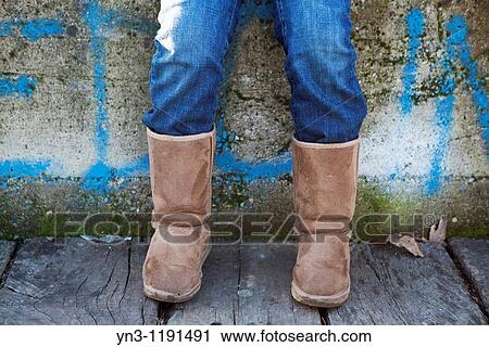 Kid wearing Australian boots. Detail View Large Photo Image Stock Image - Kid wearing Australian boots. Detail. Fotosearch