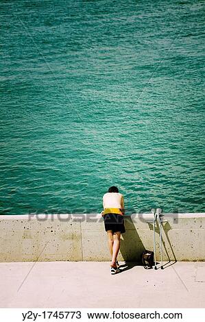 Kid with crutches looking at the sea in the port of Valencia, Spain View Large Photo Image Stock Image - Kid with crutches looking at the sea in the port of Valencia, Spain. Fotosearch