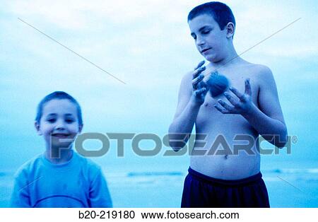 Stock Image - Kids (5 & 12 yrs). Hendaye. France. Fotosearch