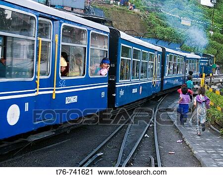 kids chasing the toy train as it leaves the station in Darjeeling View Large Photo Image Stock Image - kids chasing the toy train as it leaves the station in Darjeeling. Fotosearch