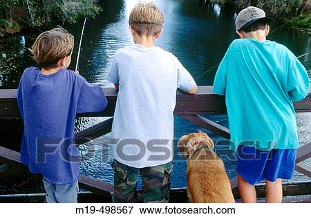 kids fishing from a bridge View Large Photo Image Stock Photo - kids fishing from a bridge. Fotosearch