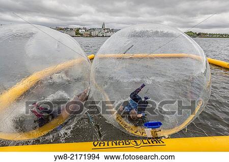 Picture - Kids having fun during Independence Day- June 17th, Reykjavik, Iceland.. Fotosearch