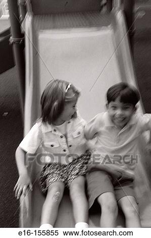Kids on slide View Large Photo Image Stock Photography - Kids on slide. Fotosearch