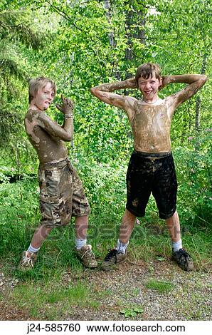 Kids playing in the mud 2006 View Large Photo Image Stock Image - Kids playing in the mud 2006. Fotosearch