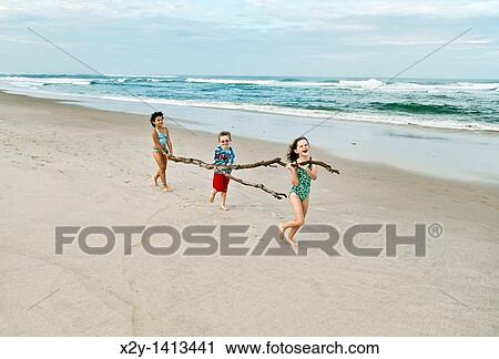 Kids playing on the beach, Cape Cod, USA View Large Photo Image Stock Image - Kids playing on the beach, Cape Cod, USA. Fotosearch