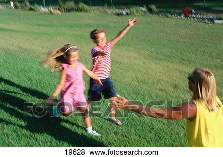 Kids running to mother View Large Photo Image Stock Photo - Kids running to mother. Fotosearch