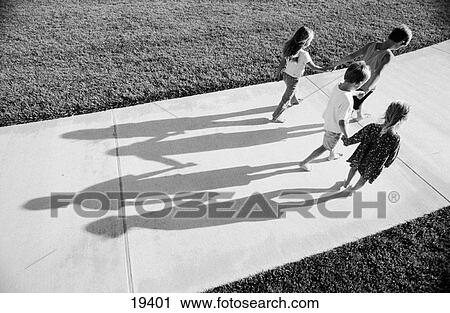 Kids walking along path View Large Photo Image Stock Image - Kids walking along path. Fotosearch