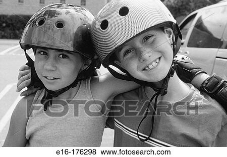 Stock Photo - Kids wearing bike helmets. Fotosearch