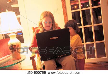 Kids with laptop View Large Photo Image Stock Photograph - Kids with laptop. Fotosearch
