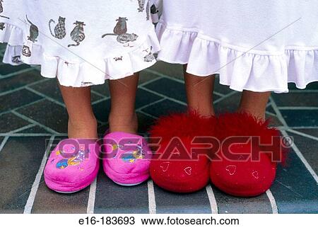 Stock Image - Kids with slippers. Fotosearch