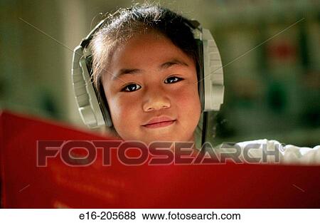 kindergarten girl with headphones View Large Photo Image Stock Photo - kindergarten girl with headphones. Fotosearch