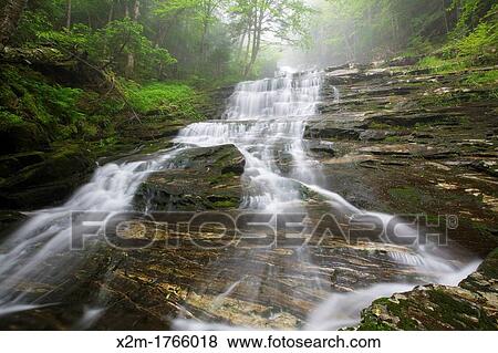 Kinsman Notch - Beaver Brook Cascades during the spring months These cascades are located along the Appalachian Tail in the White Mountain National Forest of New Hampshire USA View Large Photo Image Stock Photo - Kinsman Notch - Beaver Brook Cascades during the spring months These cascades are located along the Appalachian Tail in the White Mountain National Forest of New Hampshire USA. Fotosearch
