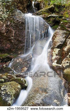 Stock Photo - Kinsman Notch - Tributary of Lost River in Woodstock, New Hampshire USA during the spring months.. Fotosearch