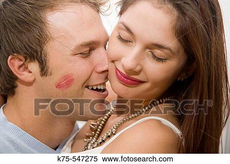 kissing and hugging View Large Photo Image Stock Photography - kissing and hugging. Fotosearch