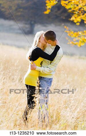 Kissing couple View Large Photo Image Stock Image - Kissing couple. Fotosearch