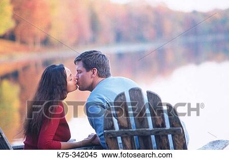Kissing lakeside View Large Photo Image Stock Photography - Kissing lakeside. Fotosearch