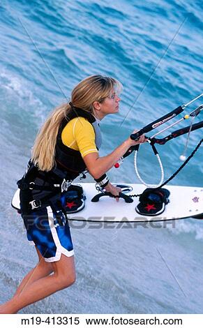 kite surfer girl View Large Photo Image Stock Photography - kite surfer girl. Fotosearch
