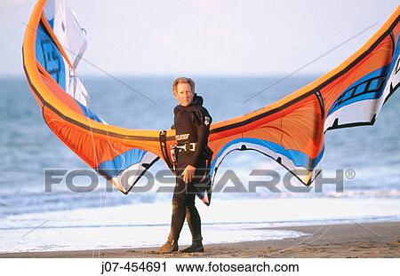 Kite surfer or kite sailor. View Large Photo Image Stock Image - Kite surfer or kite sailor.. Fotosearch
