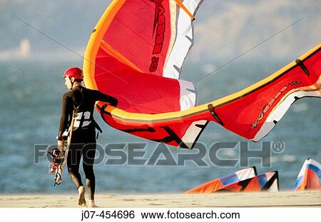 Kite surfers or kite sailors. View Large Photo Image Stock Photograph - Kite surfers or kite sailors.. Fotosearch