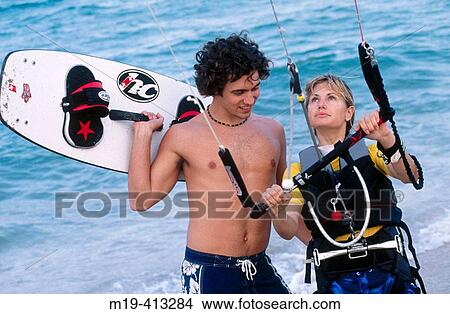 kite surfing couple View Large Photo Image Picture - kite surfing couple. Fotosearch