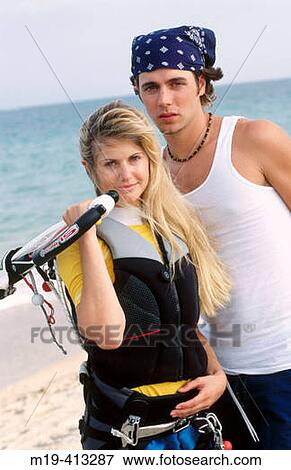 kite surfing couple View Large Photo Image Stock Photo - kite surfing couple. Fotosearch