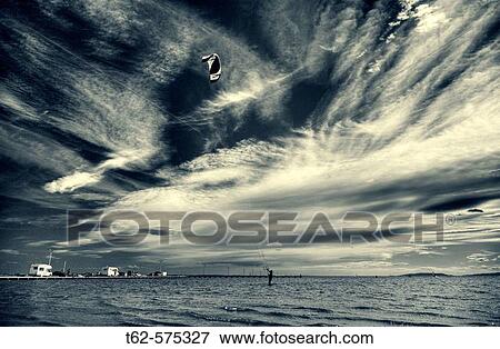 Kiteboarding. Trabucador beach. Ebro Delta National Park. Spain. View Large Photo Image Stock Photo - Kiteboarding. Trabucador beach. Ebro Delta National Park. Spain.. Fotosearch
