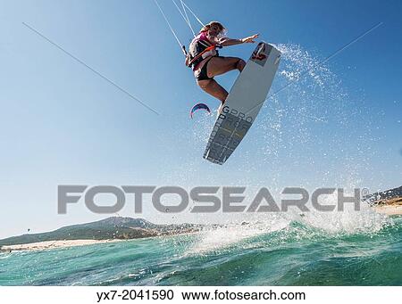 Stock Image - Kitesurfing in Tarifa, Costa de la Luz, Cadiz, Andalusia, Spain.. Fotosearch