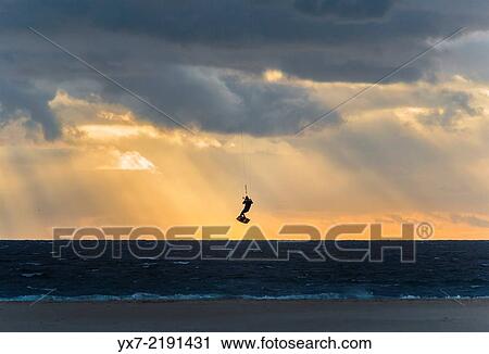 Stock Image - Kitesurfing in Tarifa, Costa de la Luz, Cadiz, Andalusia, Southern Spain, Europe.. Fotosearch