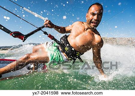 Kitesurfing in Tarifa, Costa de la Luz, Cadiz, Andalusia, Spain. View Large Photo Image Stock Photo - Kitesurfing in Tarifa, Costa de la Luz, Cadiz, Andalusia, Spain.. Fotosearch