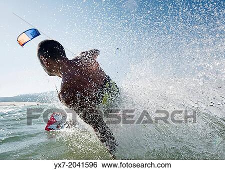 Stock Photograph - Kitesurfing in Tarifa, Costa de la Luz, Cadiz, Andalusia, Spain.. Fotosearch