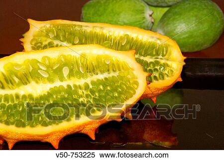 Kiwiano Fruit close up cut in half and feijoa fruits in the background View Large Photo Image Stock Photography - Kiwiano Fruit close up cut in half and feijoa fruits in the background. Fotosearch