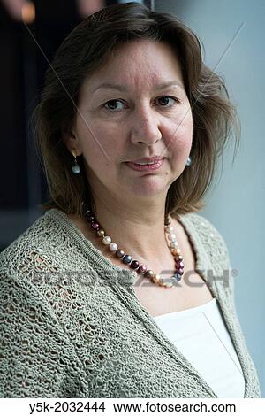 Klosterstrasse, East-Berlin, Berlin, Germany. Portrait of a German mid adult woman, working as a PR consultant at the Dutch embassy. View Large Photo Image Picture - Klosterstrasse, East-Berlin, Berlin, Germany. Portrait of a German mid adult woman, working as a PR consultant at the Dutch embassy.. Fotosearch