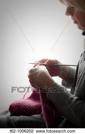 Stock Image - Knitting Needles Handicraft. Fotosearch