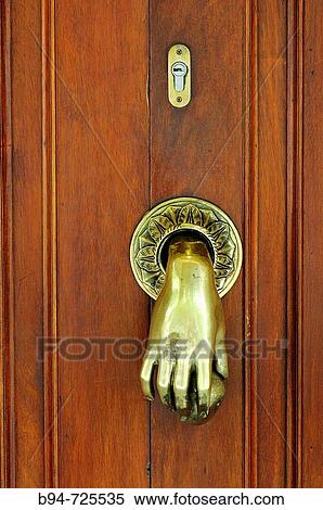 Knocker and lock at Gran de Gracia 116, Barcelona. Catalonia, Spain View Large Photo Image Stock Photography - Knocker and lock at Gran de Gracia 116, Barcelona. Catalonia, Spain. Fotosearch