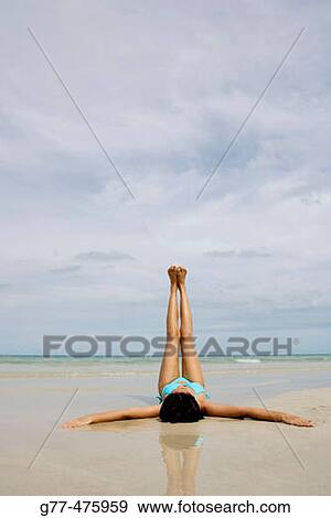 Stock Photo - Koh Samui Island. Thai woman on the beach. Thailand.. Fotosearch