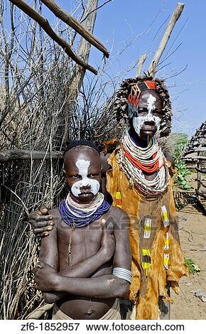 Korcho Ethiopia Africa village Lower Omo Valley Karo tribe with painted faces 25 View Large Photo Image Stock Photo - Korcho Ethiopia Africa village Lower Omo Valley Karo tribe with painted faces 25. Fotosearch